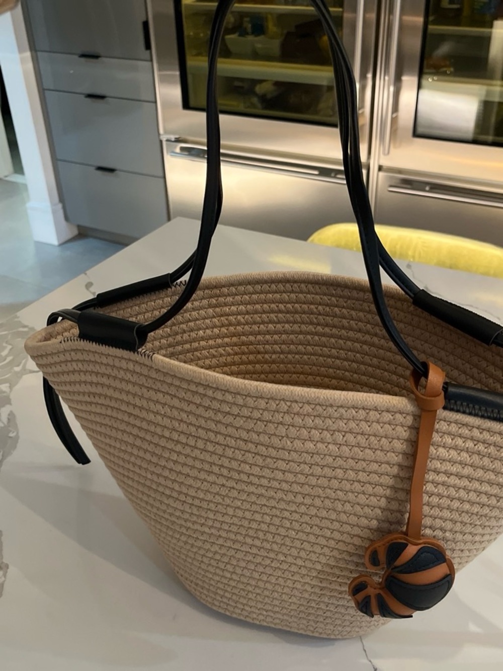 Beige Woven Tote Bag with Black Handles